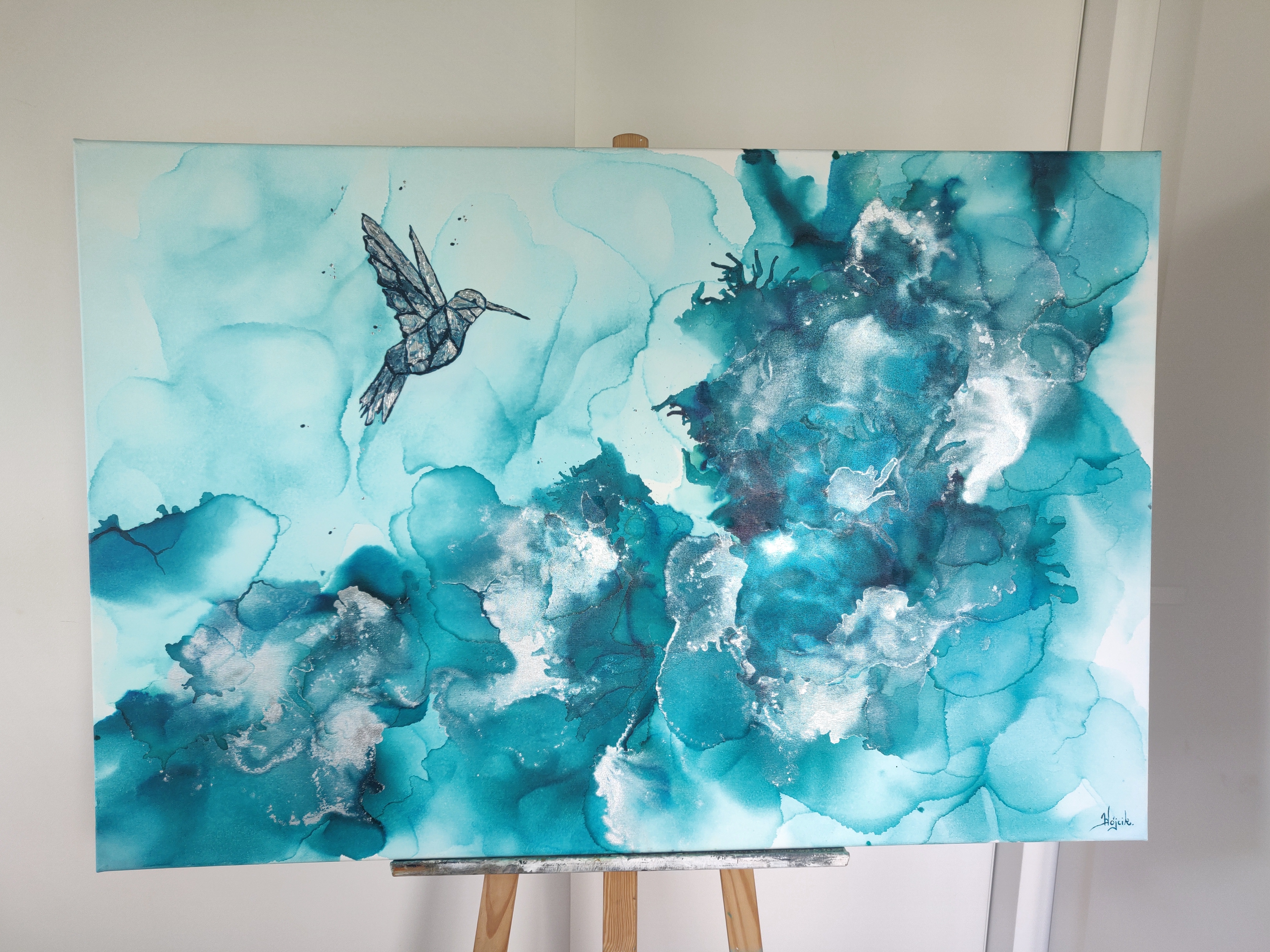 Koliber w turkusowej mgle